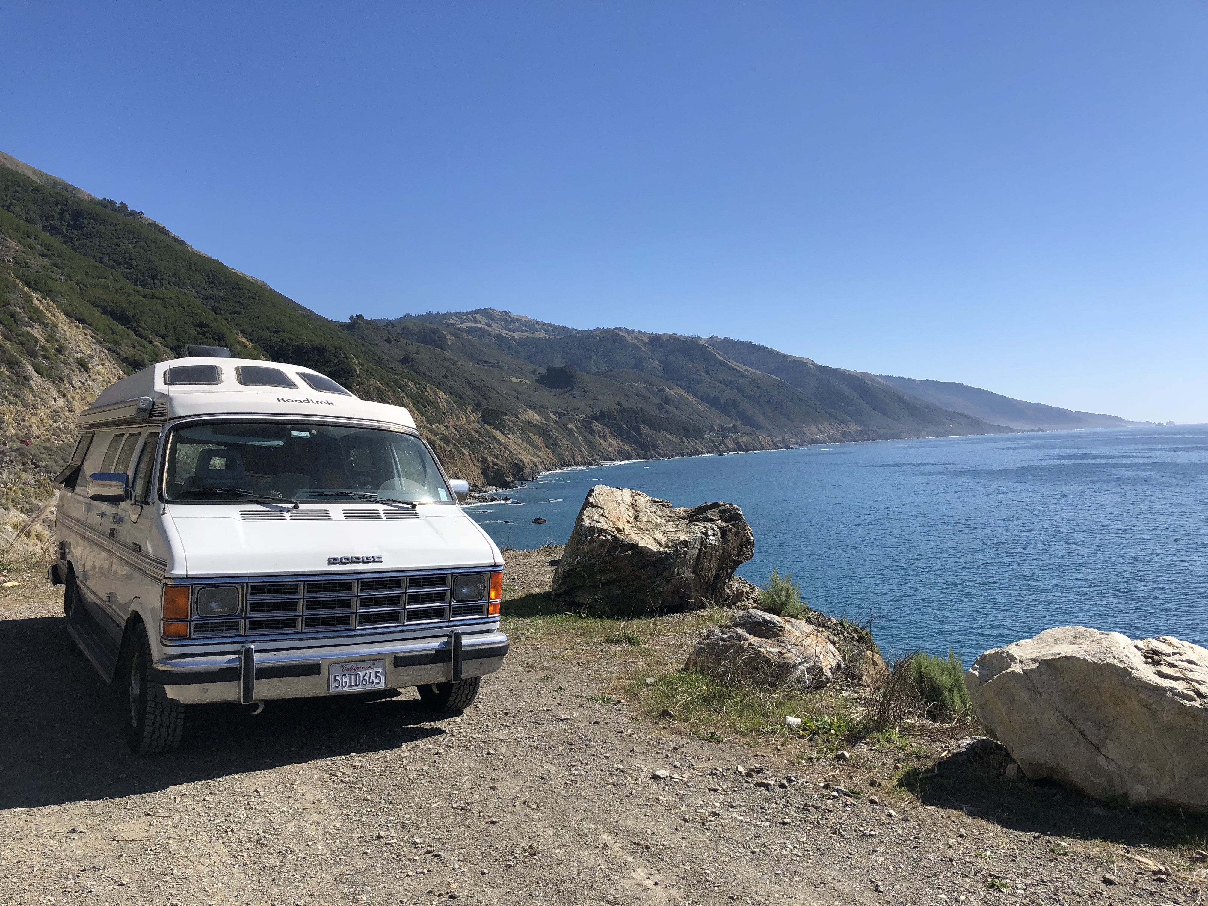 A van parked in a turnout on Highway 1
