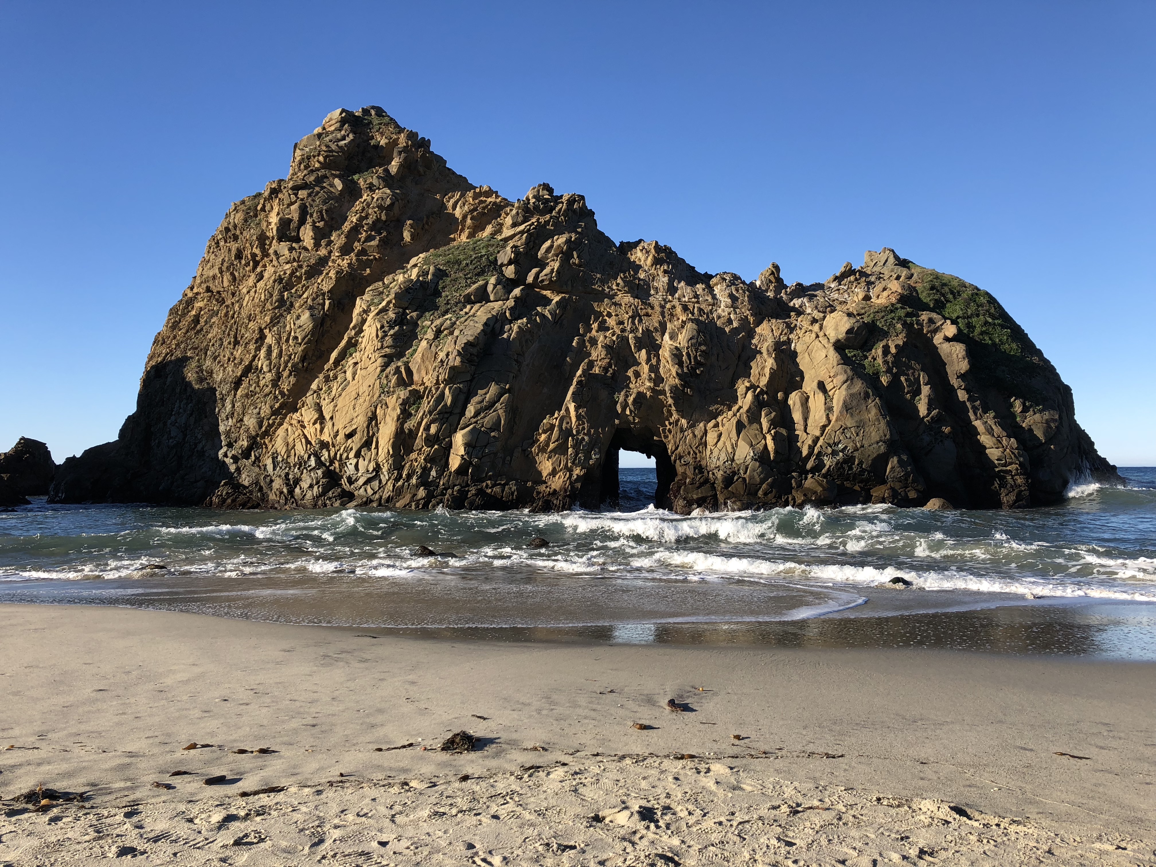 A hole in a rock at Pfeiffer Beach